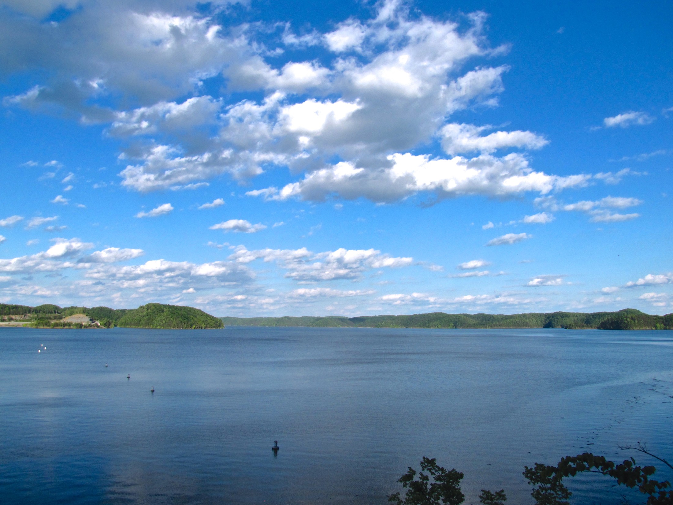 Blue water and wooded hills of Lake Cumberland near Wolf Creek Dam in Kentucky